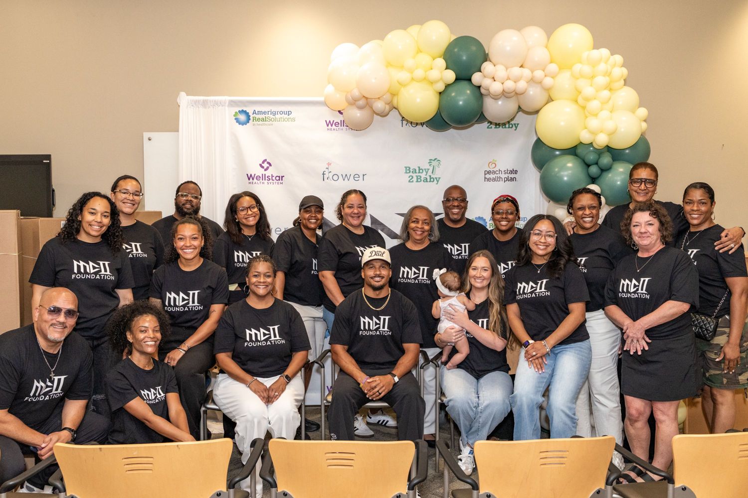Volunteers and partners together at a community health event